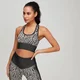 Myprotein Animal Print sieviešu bezvīļu sporta krūšturis - Melns/Brūns